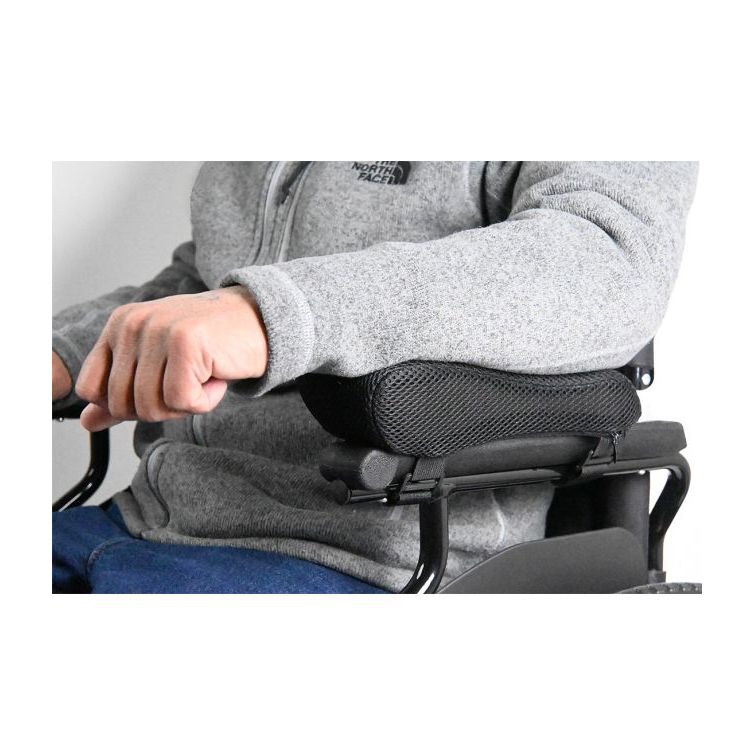 Person using a armrest on a chair with a neutral background - okotoks hc pharmacy