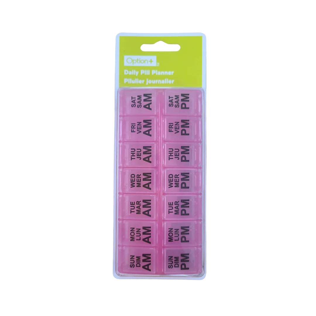 Pink daily pill planner with green label on a white background - okotoks hc pharmacy