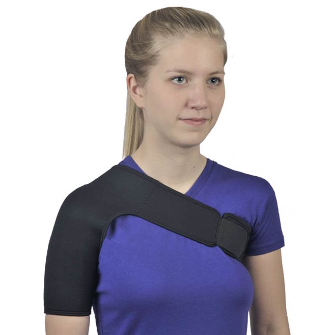 Woman wearing a black shoulder brace on a white background - okotoks hc pharmacy