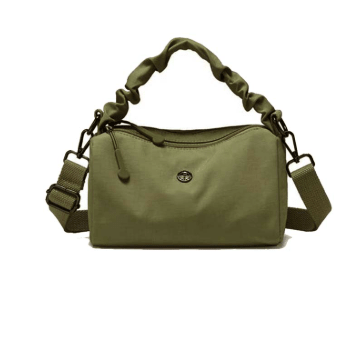 Green handbag on a white background - okotoks hc pharmacy