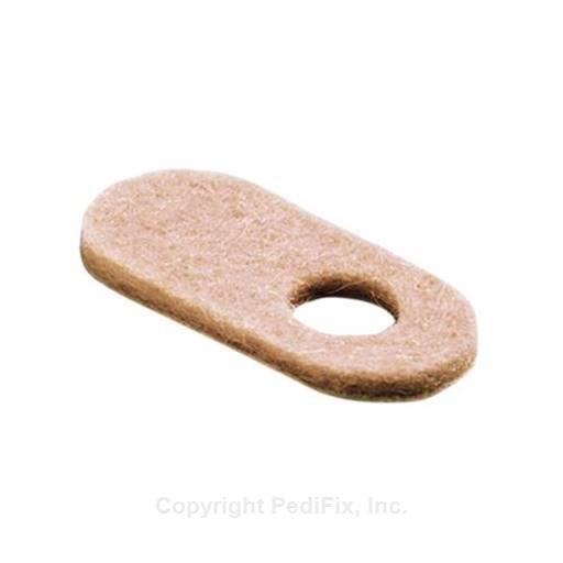 Brown oval-shaped object with a central hole on a white background - okotoks hc pharmacy