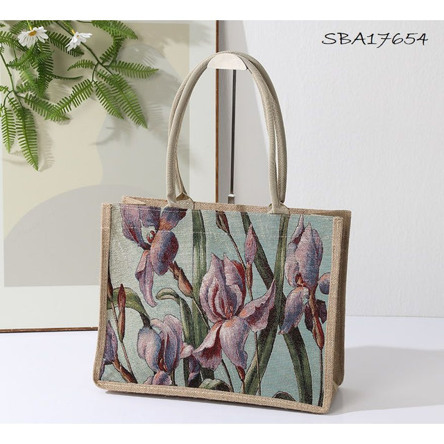 Floral-patterned tote bag on a white surface with a neutral background - okotoks hc pharmacy