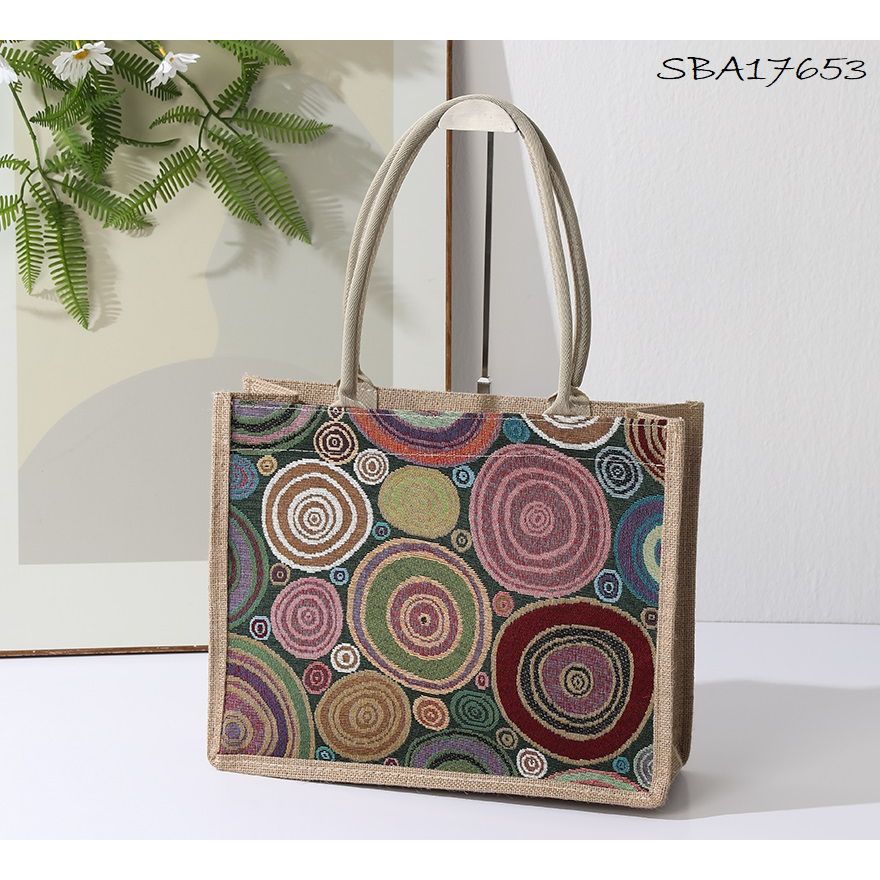 Jute bag with circular pattern on a white surface - okotoks hc pharmacy