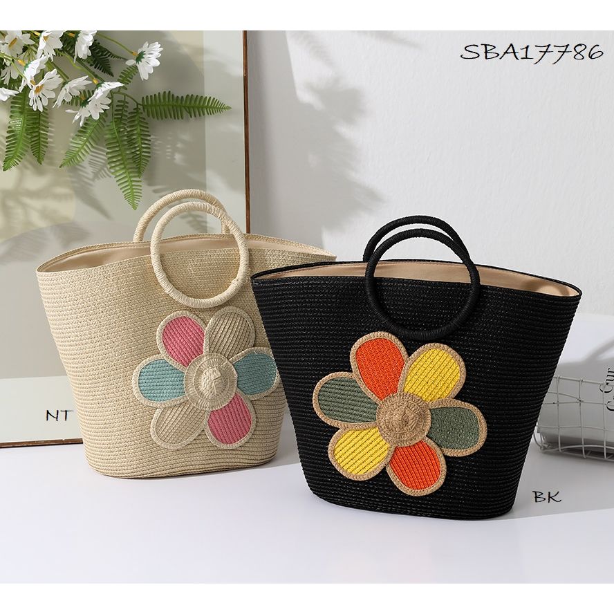 Two woven handbags with floral designs on a light background - okotoks hc pharmacy