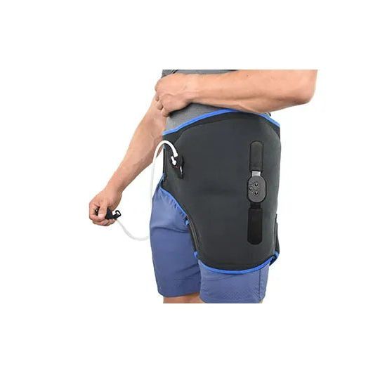 Person wearing a black hip wrap with blue accents on a white background - okotoks hc pharmacy