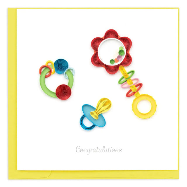 Colorful baby toys on a white background with 'Congratulations' text. - okotoks hc pharmacy