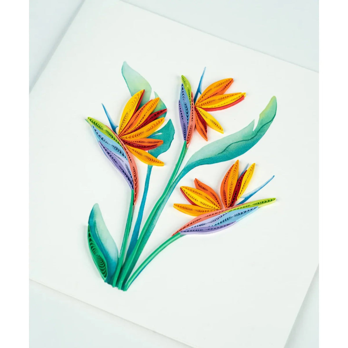 Colorful paper flower art on a white background - okotoks hc pharmacy
