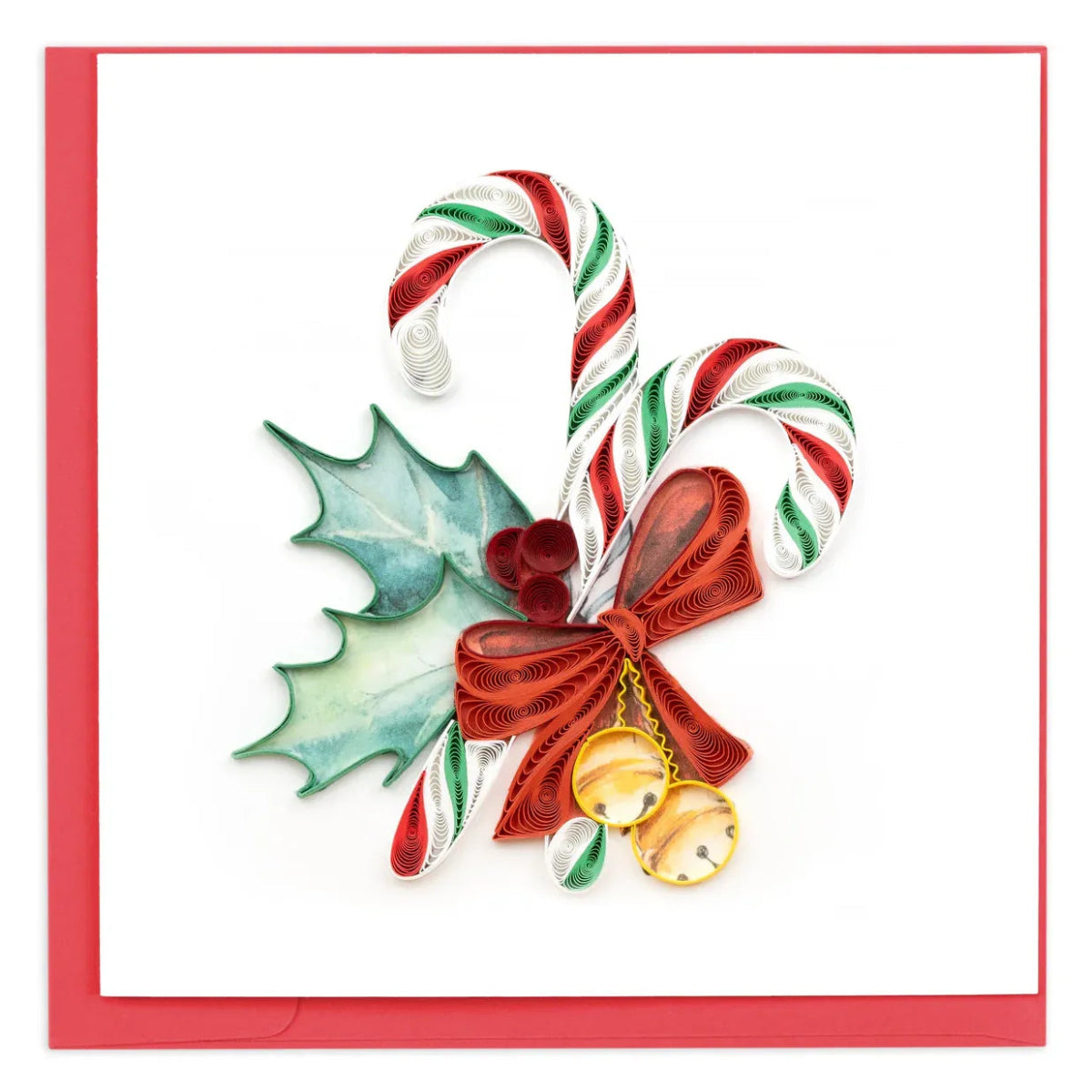 Decorative candy cane with holly leaves and bells on a white background - okotoks hc pharmacy