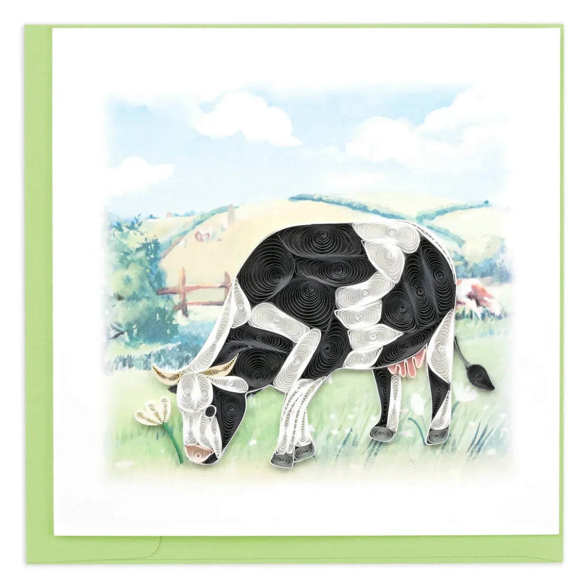 Quilled black and white cow in a pastoral setting with a green border - okotoks hc pharmacy