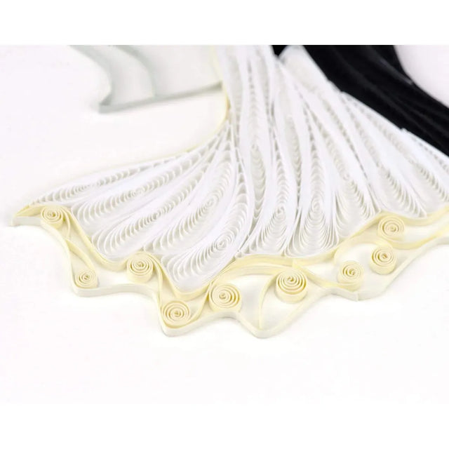 Decorative white ribbon with gold trim on a white background - okotoks hc pharmacy