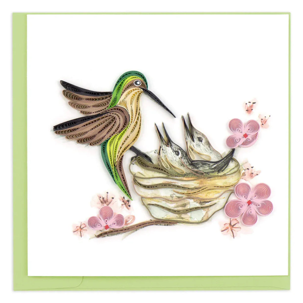 Quilled artwork of a hummingbird and eggs with pink flowers on a white background - okotoks hc pharmacy