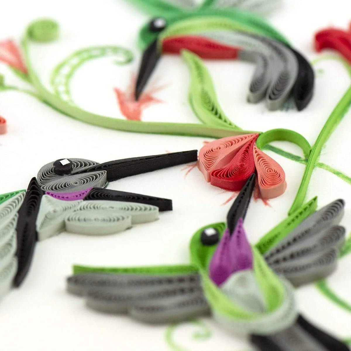 Colorful hummingbirds with decorative flowers on a white background - okotoks hc pharmacy