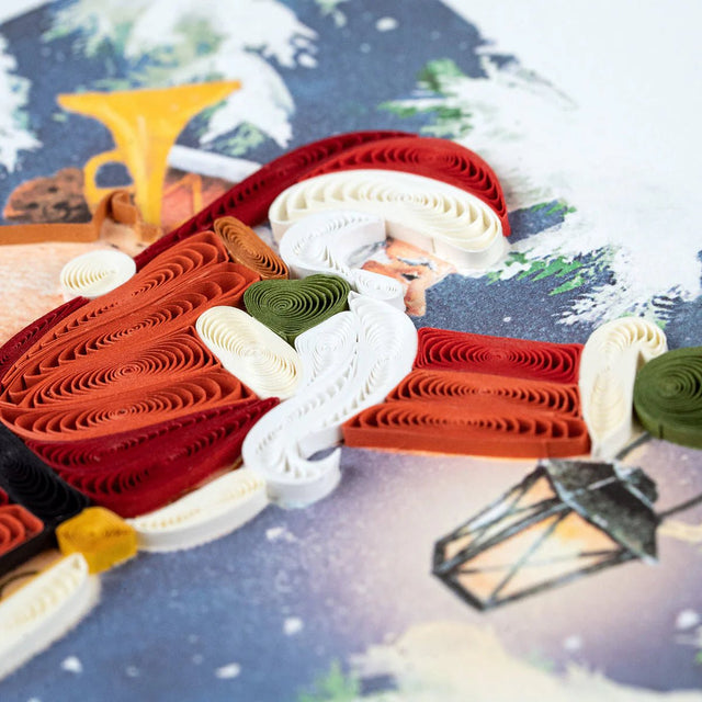 Decorative paper sculpture of santa with a Christmas scene background - okotoks hc pharmacy