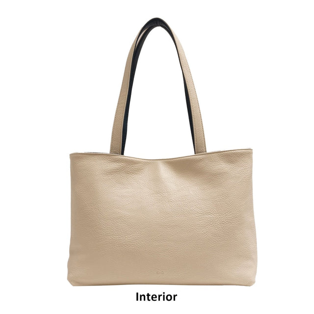 Beige handbag with black handle on a white background - okotoks hc pharmacy
