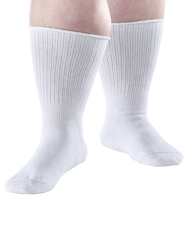A pair of white ribbed crew socks worn on a person's feet, shown against a plain white background. - okotoks hc pharmacy