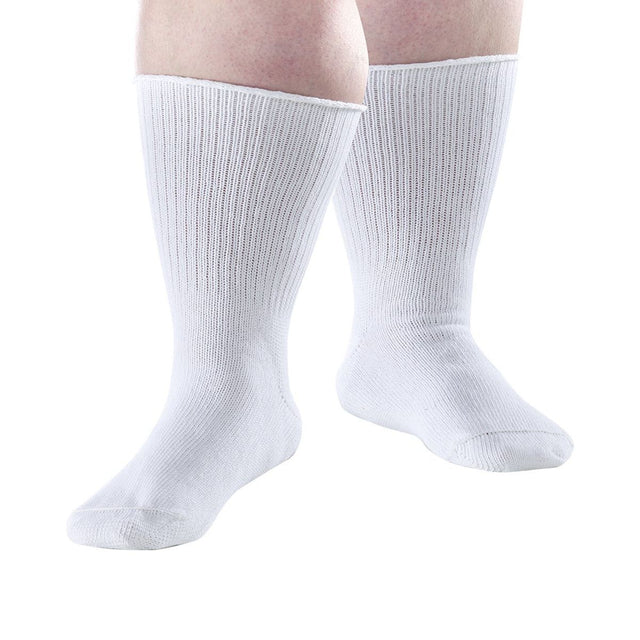 A pair of white ribbed crew socks worn on a person's feet, shown against a plain white background. - okotoks hc pharmacy