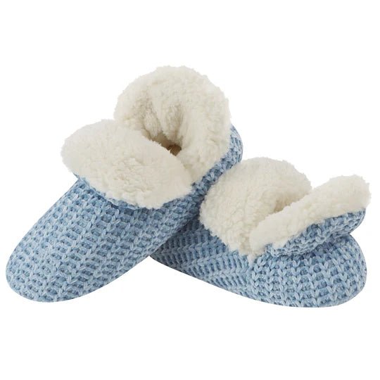Pair of blue knitted slippers with white fuzzy lining on a white background - okotoks hc pharmacy