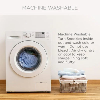 White washing machine with a basket of clothes on a wooden floor, text indicating machine washable instructions. - okotoks hc pharmacy
