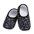 Pair of black and white patterned slippers on a white background - okotoks hc pharmacy
