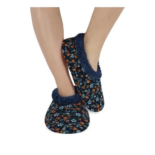 Navy blue slippers with orange floral pattern worn by a person on a white background - okotoks hc pharmacy