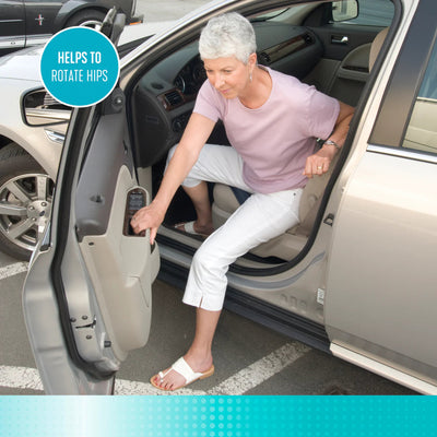 Woman using a car door step to get into a vehicle - Okotoks HC Pharmacy