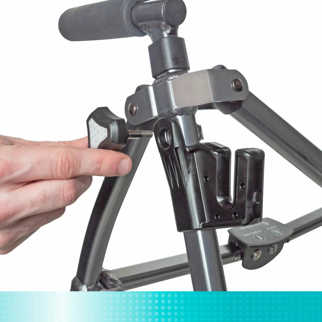 Hand adjusting a metal walker on a white background - okotoks hc pharmacy