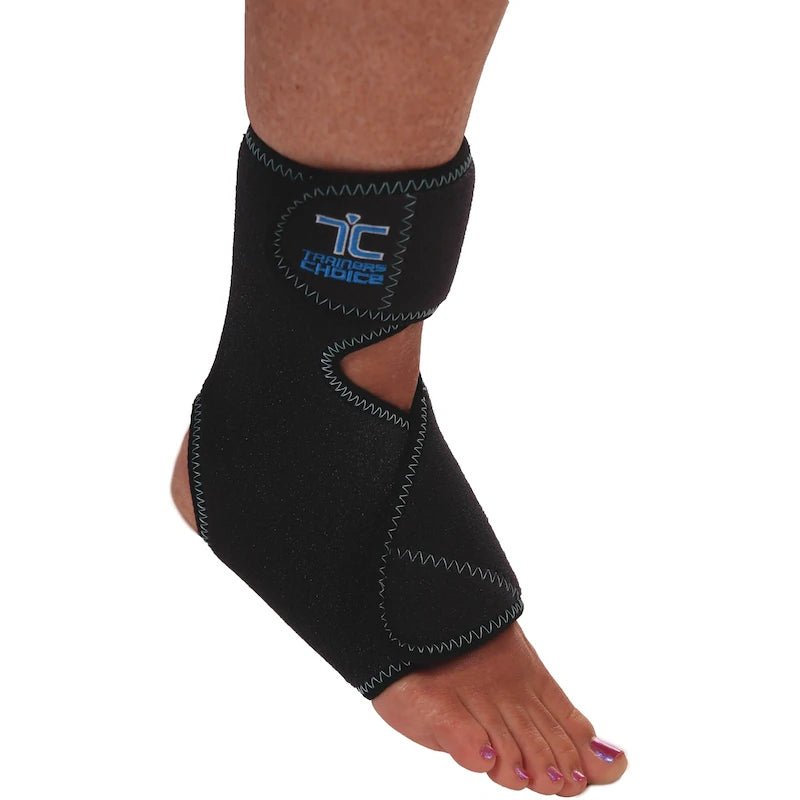 Black ankle support brace on a person's foot with a visible brand logo against a white background - okotoks hc pharmacy