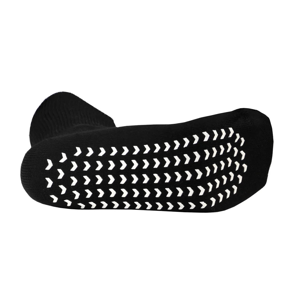 Black sock with white arrow pattern on a white background - okotoks hc pharmacy
