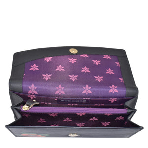 Purple clutch bag with pink floral pattern on a white background - okotoks hc pharmacy