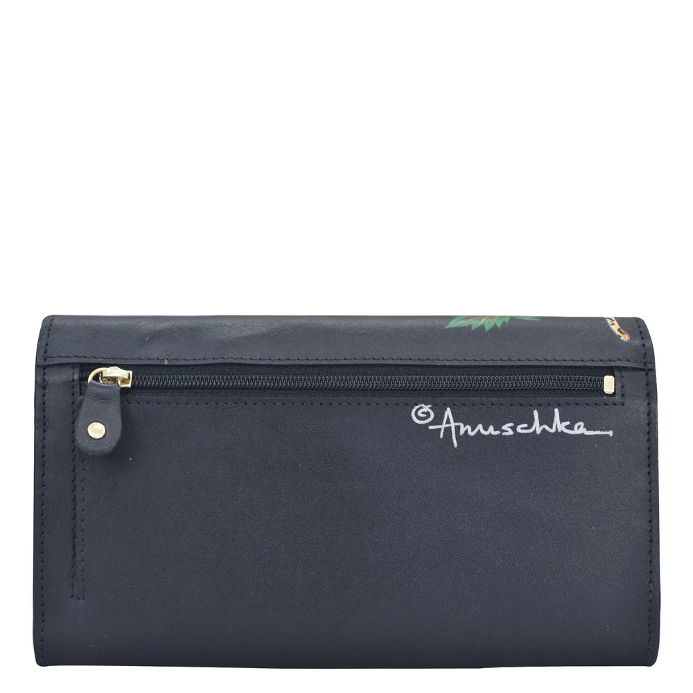 Black pouch with gold zipper and 'Anuschka' branding on a white background - okotoks hc pharmacy