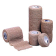 Set of beige elastic bandages of different sizes on a white background - okotoks hc pharmacy