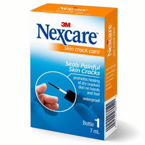 A box of 3M Nexcare skin crack care, bottle 1, 7 mL, shown on a clean white background. The packaging features a blue and orange design with a circular inset showing a hand holding a small black applicator. - okotoks hc pharmacy
