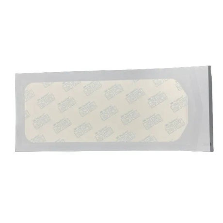Bandage in a clear plastic packaging on a white background - okotoks hc pharmacy