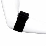 Black strap attached to a white arm on a white background - okotoks hc pharmacy