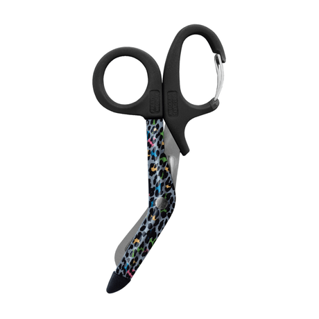 Scissors with black handles and colorful patterned blades on a white background - okotoks hc pharmacy