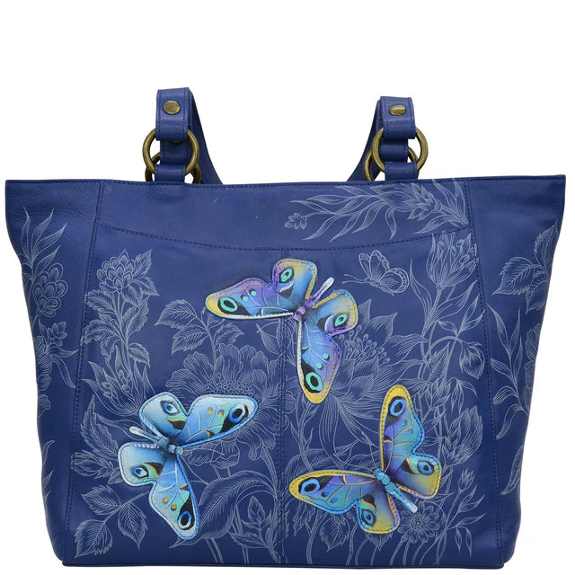Blue tote bag with butterfly design on a white background - okotoks hc pharmacy