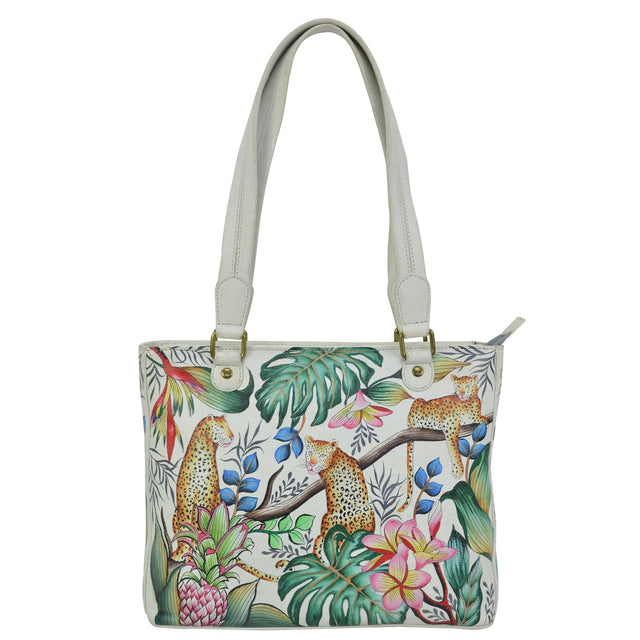 Handbag with tropical animal and plant design on a white background - okotoks hc pharmacy