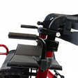 Close-up of a red and black mobility scooter with a focus on the seat and handlebar area. - okotoks hc pharmacy