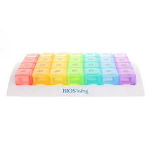 Colorful pill organizer with BIOS living branding on a white background - okotoks hc pharmacy