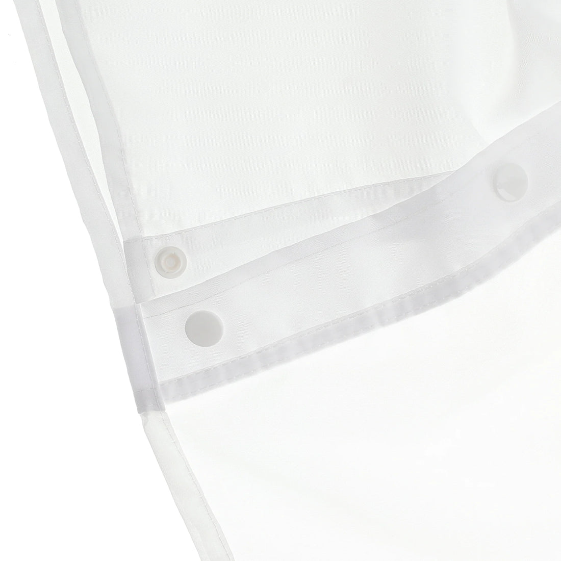 Close-up of a white fabric item with a curved hem, white snap buttons, and a sheer white trim on a white background. - okotoks hc pharmacy