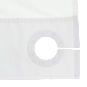 Close-up of a white curtain panel showing the fabric texture, stitched hem, and a circular grommet ring on the corner. - okotoks hc pharmacy