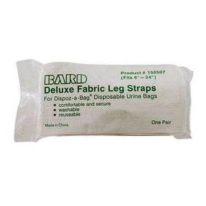 A packaged pair of Bard Deluxe Fabric Leg Straps, shown in its white plastic wrapper with green text on a plain white background. - okotoks hc pharmacy