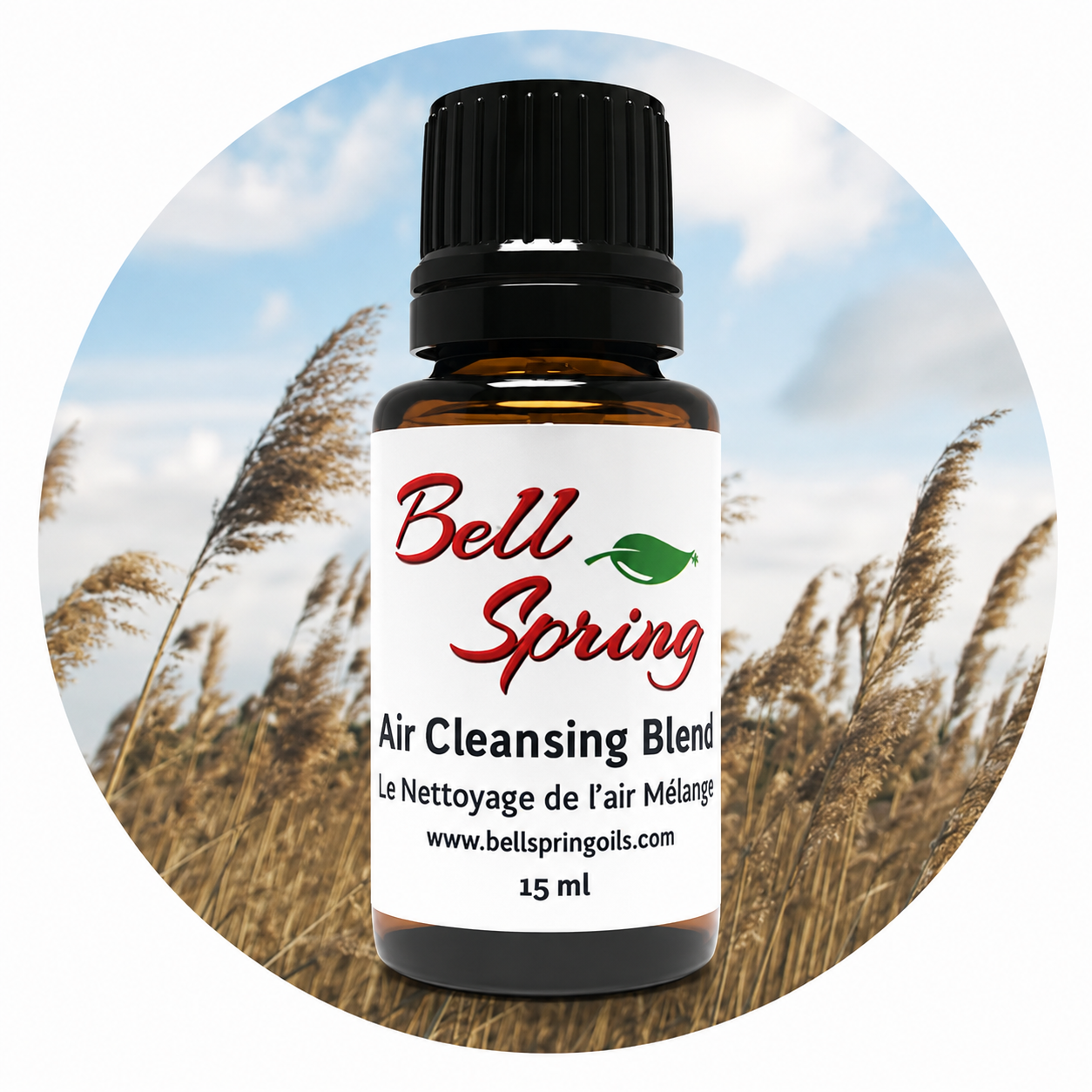A 15 ml bottle of Bell Spring Air Cleansing Blend essential oil on a circular background depicting a field of reeds under a blue sky. - okotoks hc pharmacy