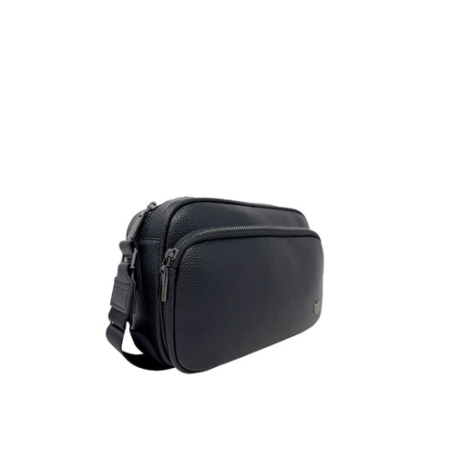 A black pebbled leather crossbody bag with a top zipper and a front zippered pocket, shown on a plain white background. - okotoks hc pharmacy