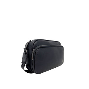 A black pebbled leather crossbody bag with a top zipper and a front zippered pocket, shown on a plain white background. - okotoks hc pharmacy