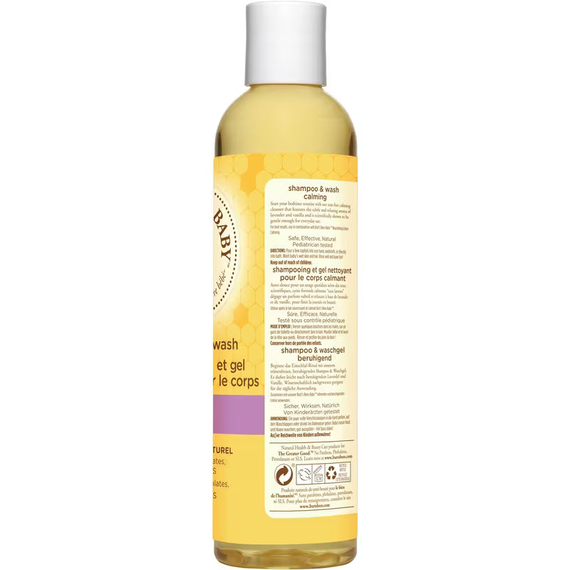 Bottle of baby wash with a yellow label on a white background - okotoks hc pharmacy