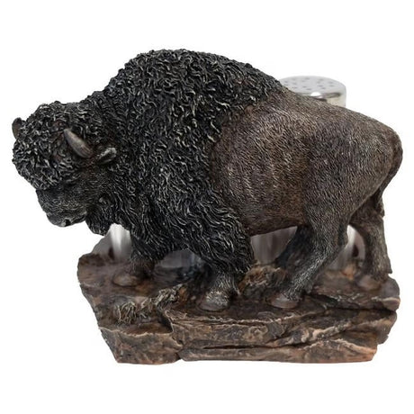 Bronze-colored bison figurine on a white background - okotoks hc pharmacy