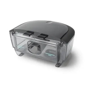 Clear plastic container with black lid on a white background - okotoks hc pharmacy