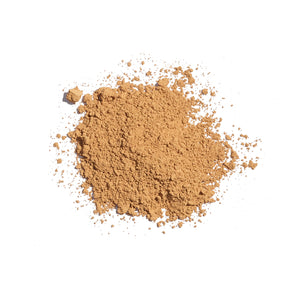 Brown powder on a white background - okotoks hc pharmacy