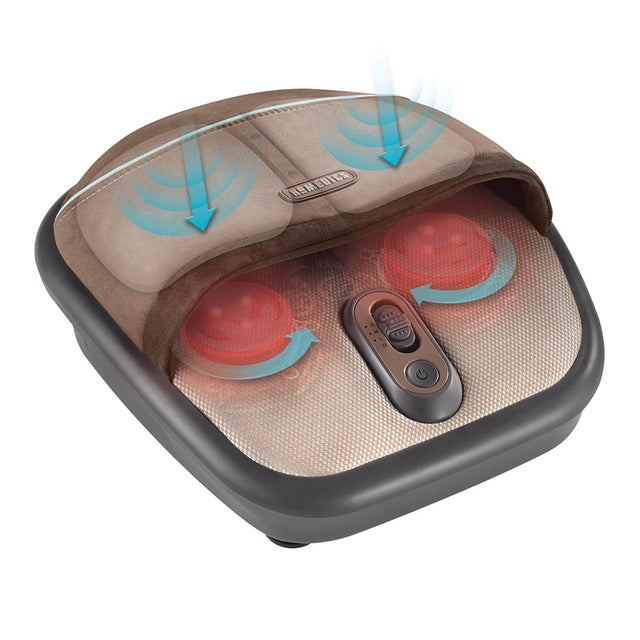 A foot massage pillow with a beige and brown interior, featuring red circular massage nodes, blue airflow arrows, and a central control button, shown on a plain white background. - okotoks hc pharmacy